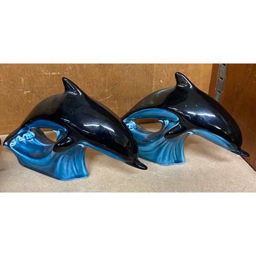 744 - Selection of 6 Poole Pottery swimming Dolphin figures