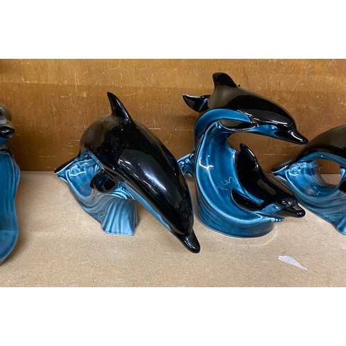 758 - Selection of 4 Poole Pottery Dolphin figures includes 2 double dolphin figures etc