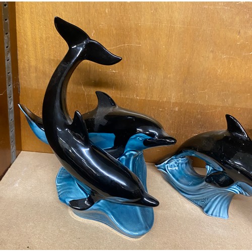 758 - Selection of 4 Poole Pottery Dolphin figures includes 2 double dolphin figures etc