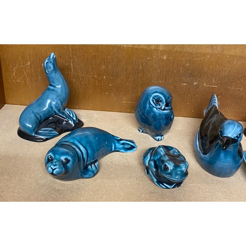 727 - Large selection of Poole pottery animal figures includes Seal, Duck, Owl, Squirrel