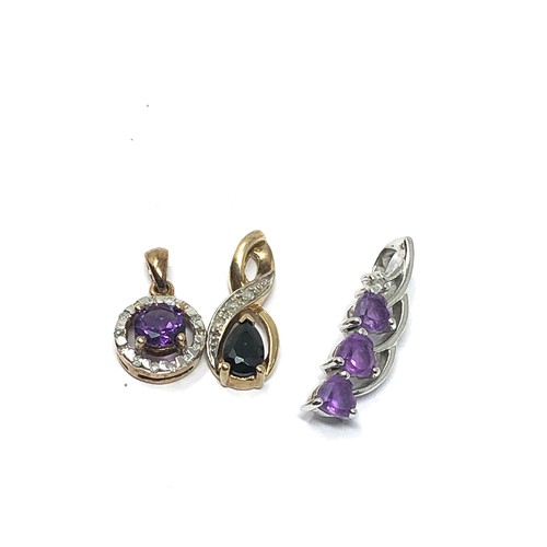 317 - 3 x 9ct yellow and white gold gemstone set pendants inc. amethyst, diamond & black gemstone (3.6g)