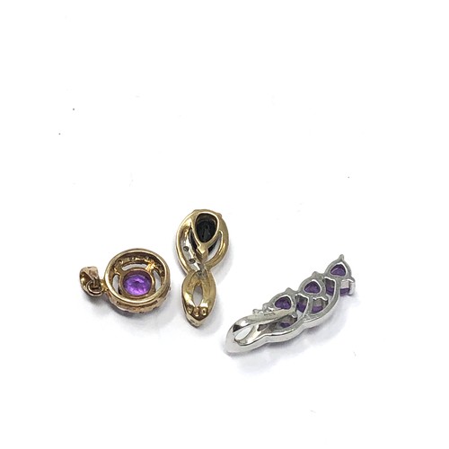 317 - 3 x 9ct yellow and white gold gemstone set pendants inc. amethyst, diamond & black gemstone (3.6g)