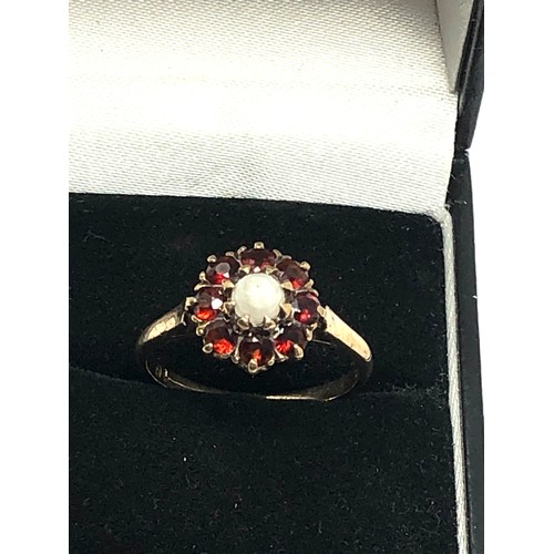 214 - 9ct gold vintage pearl & garnet halo dress ring (2.3g)