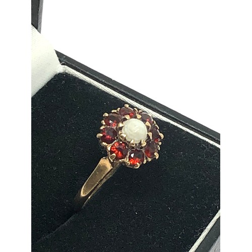 214 - 9ct gold vintage pearl & garnet halo dress ring (2.3g)