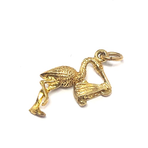 222 - 9ct gold vintage articulated stork & baby charm (1.8g)