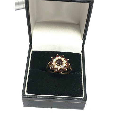 227 - 9ct gold vintage garnet & opal double halo dress ring (3.2g)