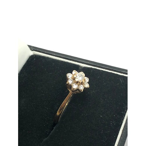 211 - 9ct gold diamond floral cluster dress ring (1.2g)