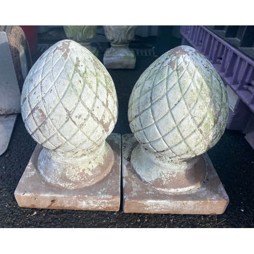 578 - Pair of concrete finials measures approx 13 inches tall