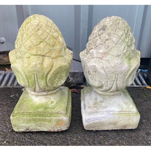 579 - Pair of concrete finials measures approx 11 inches tall