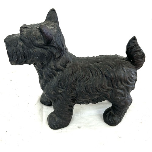 750 - Cast iron scottie dog door stop measures approx 6.5 inches tall 7.5 inches wide