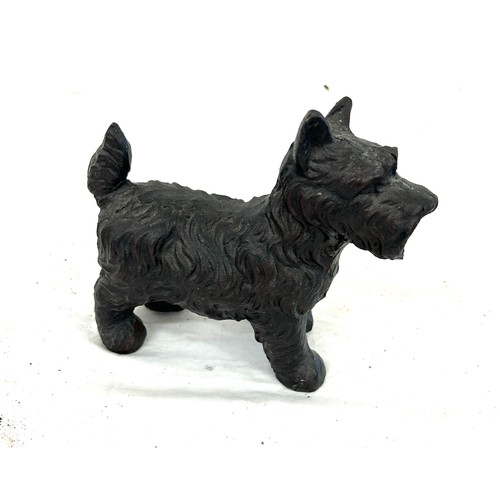 750 - Cast iron scottie dog door stop measures approx 6.5 inches tall 7.5 inches wide