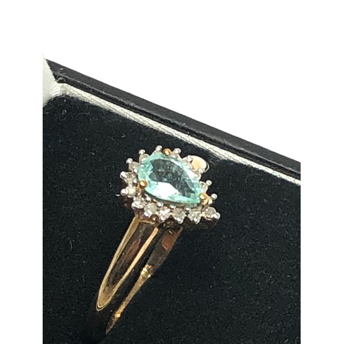 269 - 9ct gold tourmaline & diamond halo dress ring (2.3g)