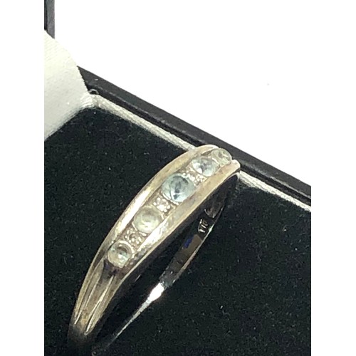 270 - 9ct white gold blue topaz & diamond gypsy setting ring (3.1g)