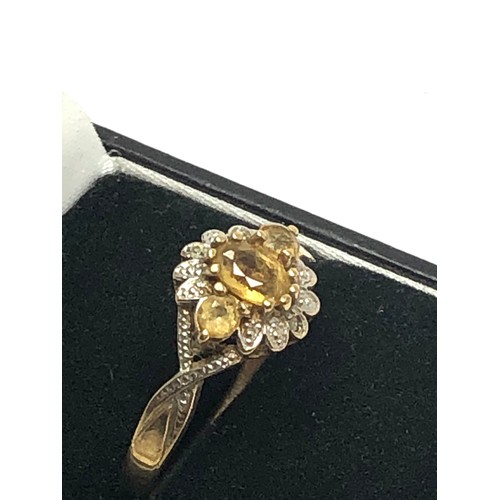 265 - 9ct gold citrine & diamond cluster dress ring (2.5g)