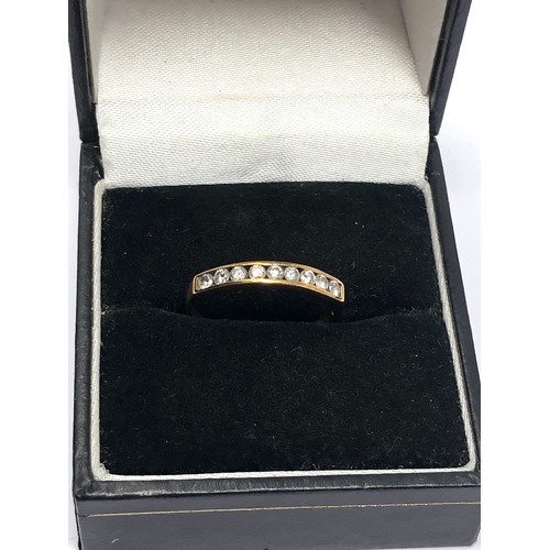 272 - 9ct gold diamond channel setting ring (1.1g)