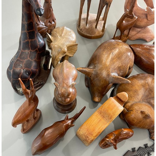 640 - Large selection carved wooden animal / mammal ornaments to include giraffe, duck, dolphin etc