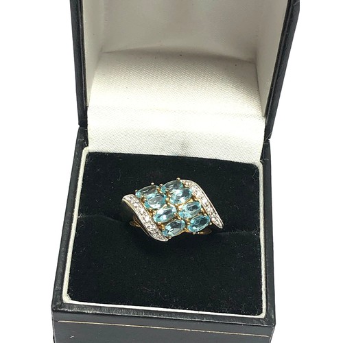 224 - 9ct gold aquamarine & diamond dress ring (4.1g)