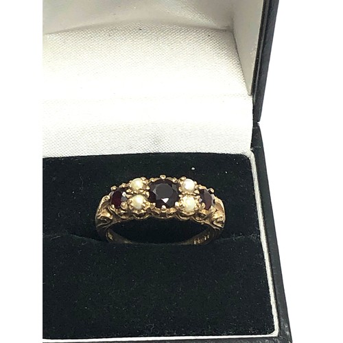 309 - 9ct gold vintage garnet & pearl gypsy setting ring (3.6g)