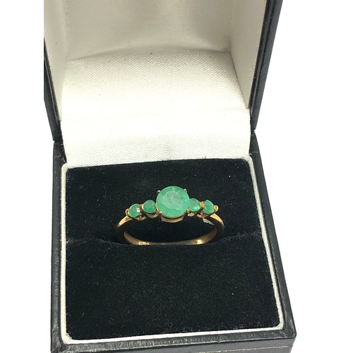 315 - 9ct gold emerald five stone dress ring (1.9g)