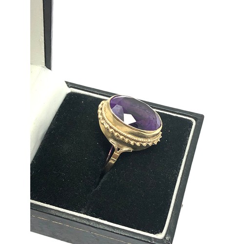 314 - 9ct gold vintage amethyst rope bordered cocktail ring (4.6g)