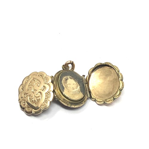 302 - 9ct gold back & front antique foliate locket (4.9g)