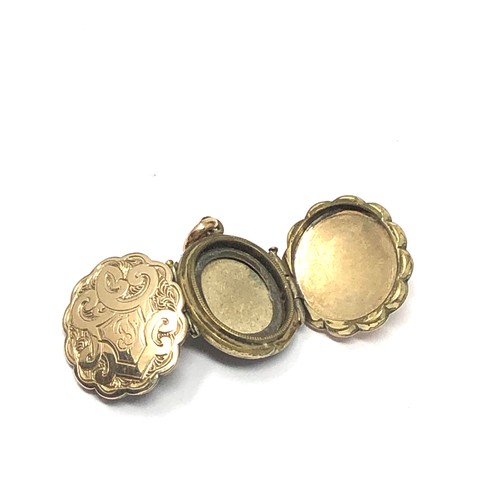 302 - 9ct gold back & front antique foliate locket (4.9g)