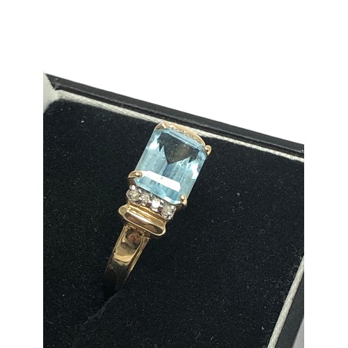 295 - 9ct gold blue topaz & diamond statement dress ring (1.9g)