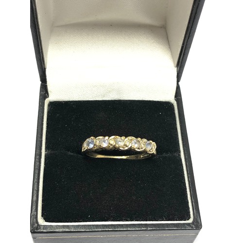 293 - 9ct gold tanzanite & diamond half-eternity dress ring (2g)