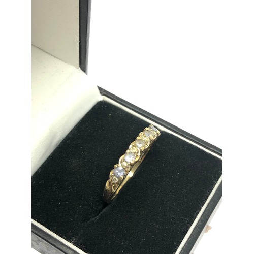 293 - 9ct gold tanzanite & diamond half-eternity dress ring (2g)