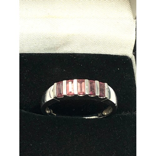 287 - 9ct white gold pink gemstone dress ring (2.4g)