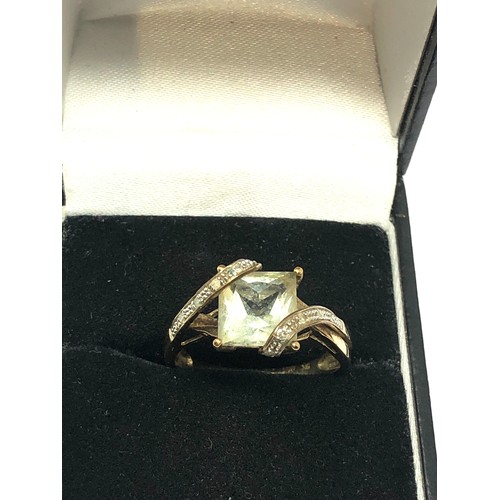 255 - 9ct gold diamond & prasiolite dress ring (2.8g)