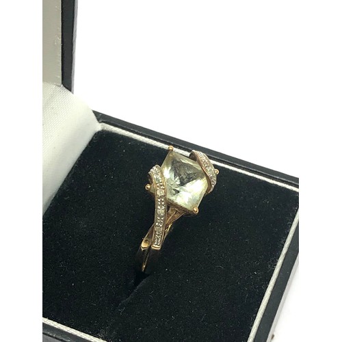 255 - 9ct gold diamond & prasiolite dress ring (2.8g)