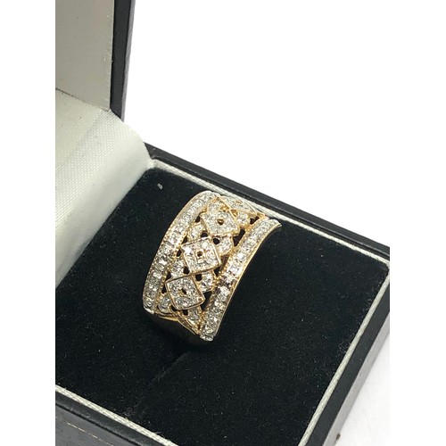 247 - 9ct gold diamond openwork dress ring (3.3g)