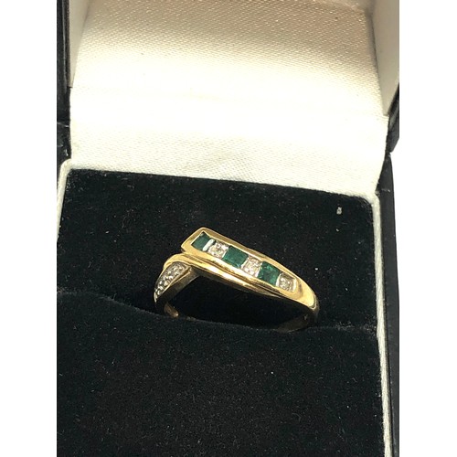 233 - 9ct gold diamond & emerald chevron ring (1.9g)