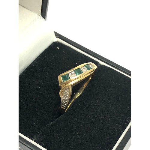 233 - 9ct gold diamond & emerald chevron ring (1.9g)