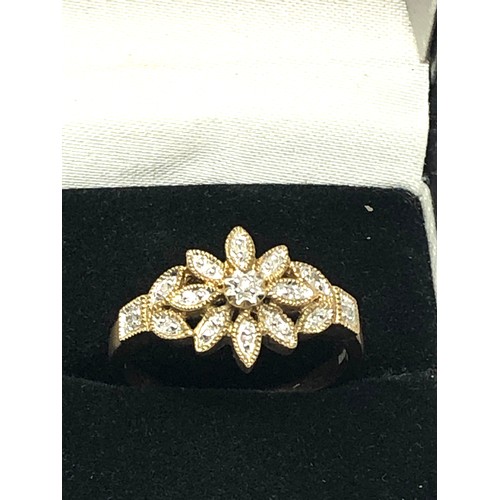 232 - 9ct gold diamond floral dress ring (2.9g)