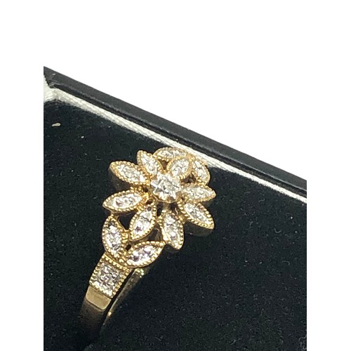 232 - 9ct gold diamond floral dress ring (2.9g)