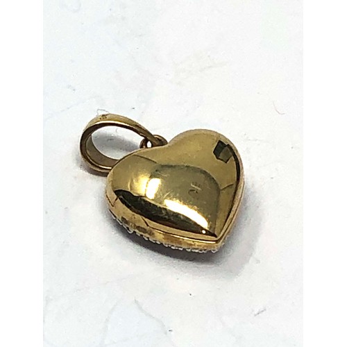 254 - 9ct gold diamond heart locket pendant (2.3g)