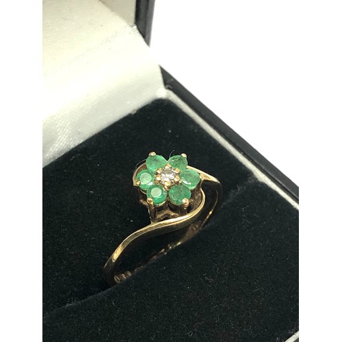 237 - 9ct gold diamond & emerald floral cluster ring (1.9g)