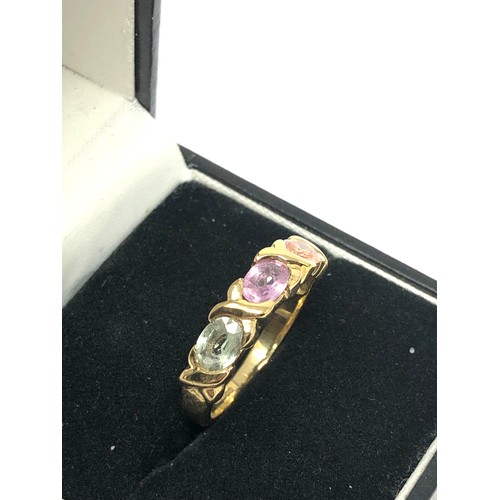 199 - 9ct gold multicolour sapphire set trillogy ring (2.6g)