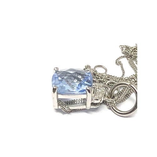 165 - 9ct white gold diamond accented chequer cut blue quartz pendant necklace (1.7g)