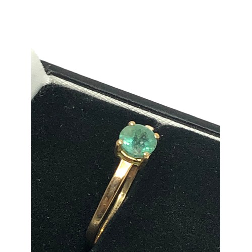 139 - 9ct gold emerald set solitaire ring (0.9g)