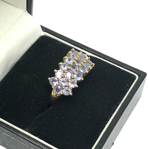 179 - 9ct gold tanzanite cluster ring (3.9g)