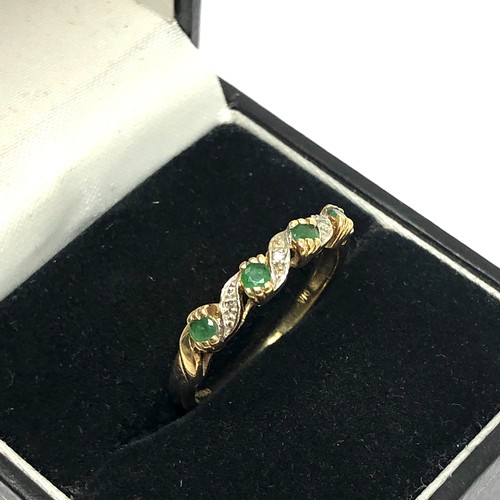 159 - 9ct gold emerald and diamond set half hoop eternity ring (1.9g)