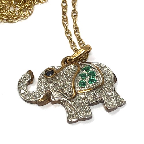 163 - 9ct gold sapphire diamond and emerald set elephant pendant necklace (2.6g)