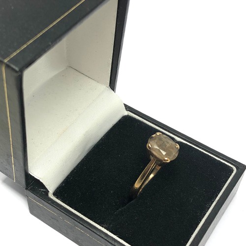 174 - 9ct gold smokey quartz solitaire ring (2.5g)