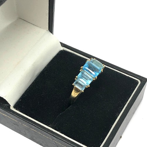 168 - 9ct gold blue topaz set statement ring (3g)