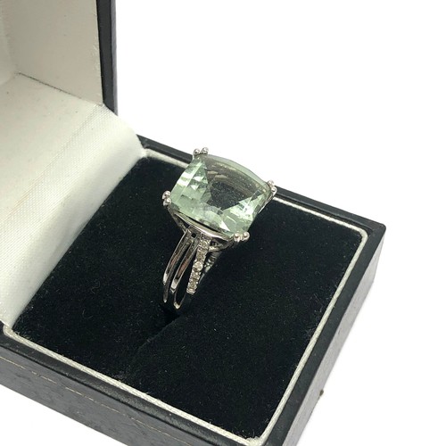 141 - 9ct white gold diamond accented chequer cut prasiolite cocktail ring (5g)