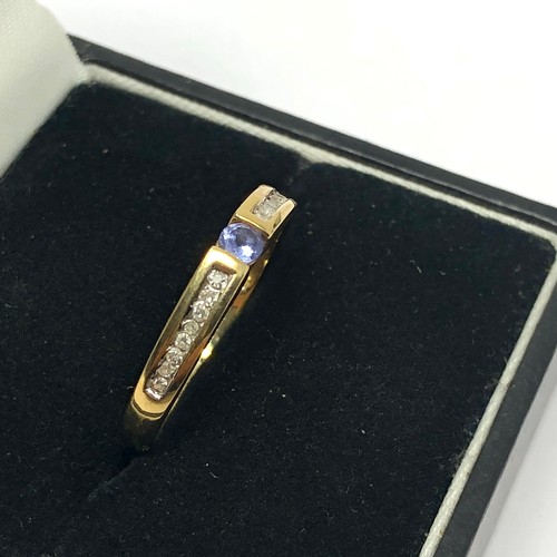 131 - 9ct gold tanzanite and diamond set stacking ring (1.7g)