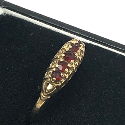 149 - 9ct gold garnet gypsy setting ring (1.5g)